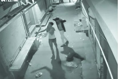 CCTV footage of a thief dancing before he break into a shop