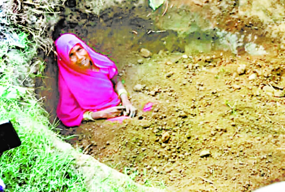 goons tried to burry a woman alive in a pathole.