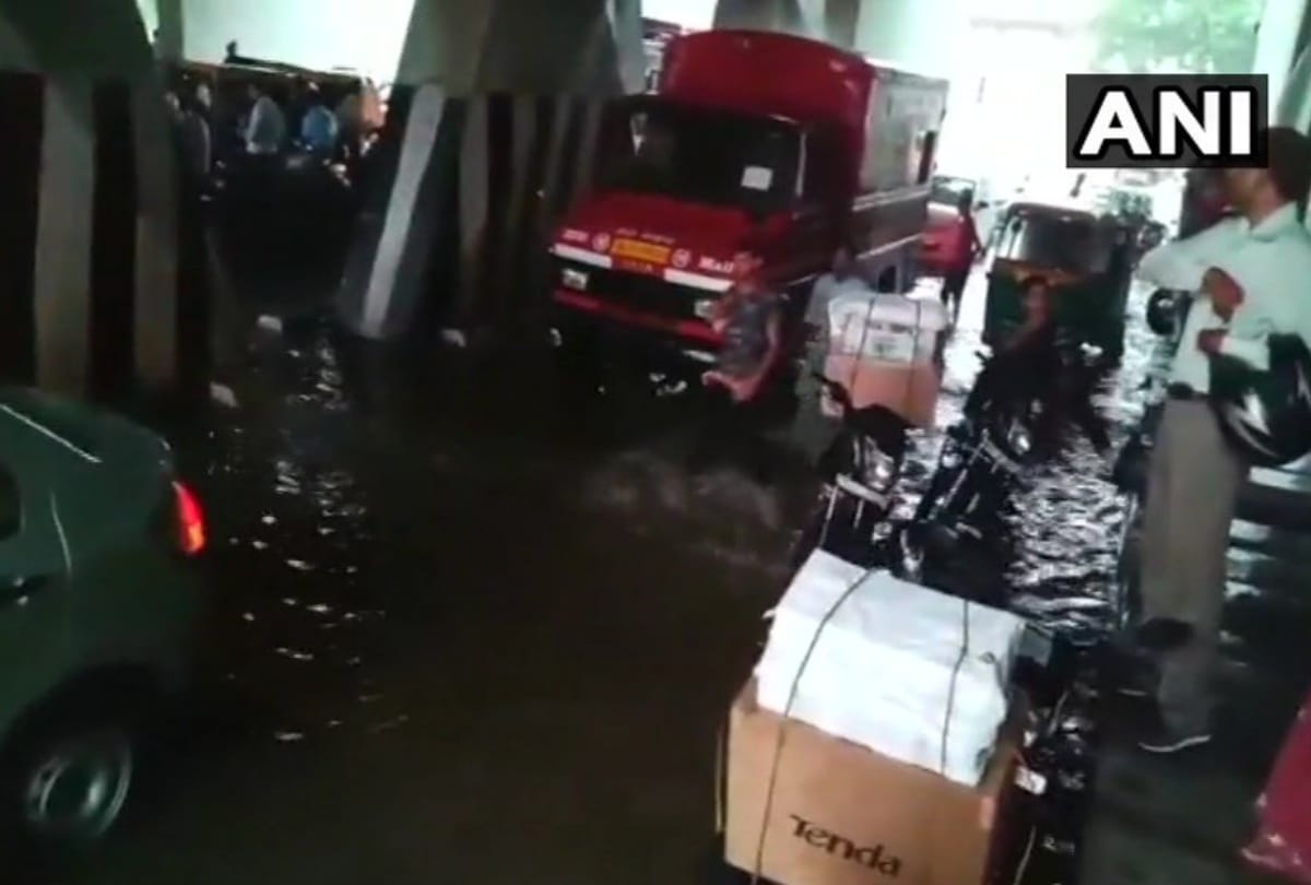 photos of rain in delhi ncr road clogged, water logging in delhi secretariat 3 day heavy rain alert