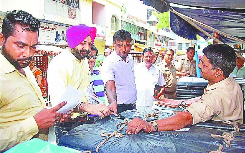 Raids on city shops, seized polythene
