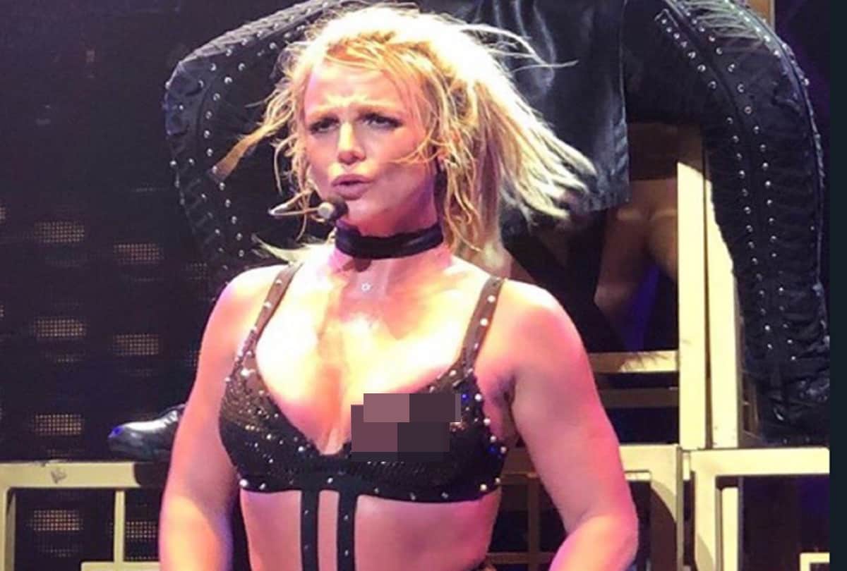 britney spears suffers wardrobe malfunction on stage during live concert