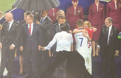 vladimir putin trolled on twitter for using umbrella during presentation ceremony