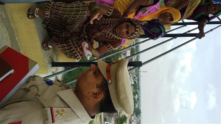 Women of Nagla Dhadhu climbed on water tank for road