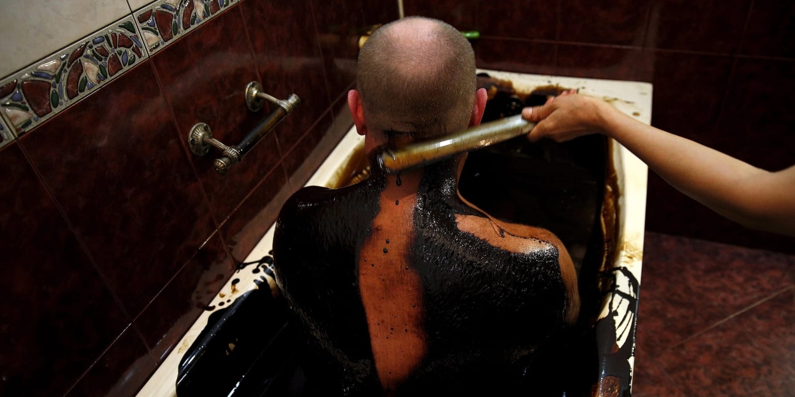 Dangerous method for treatment, patients bath in crude oil
