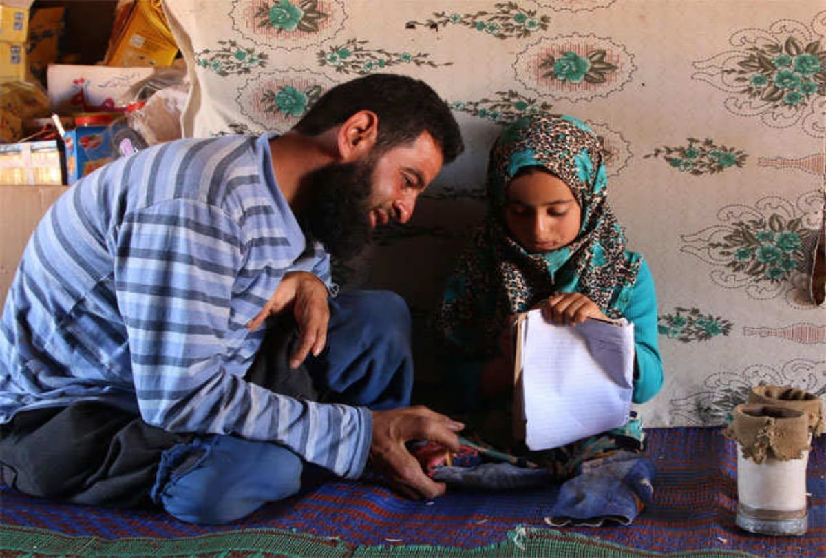 eight years old girl who used tin cans for legs in northern syria 