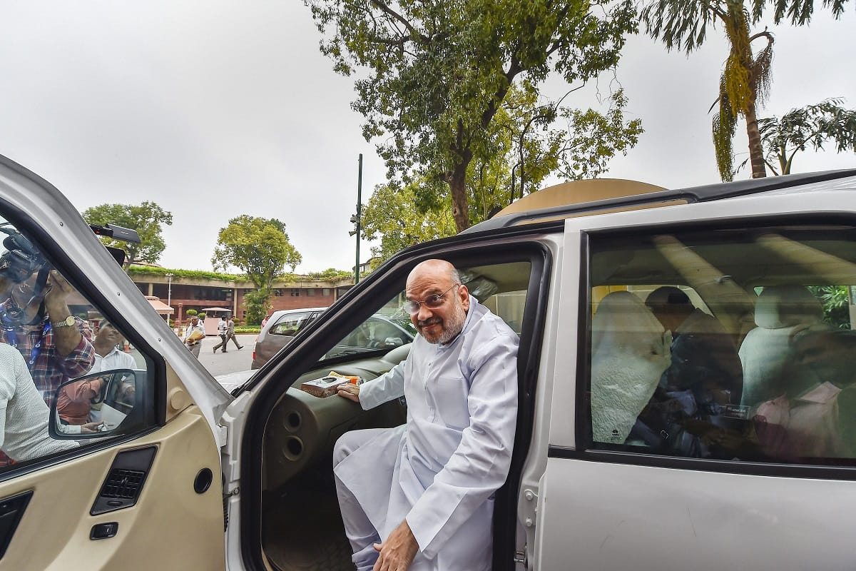 Two young women jumped in front of amit shah convoy arrested by police 