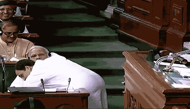 no confidence motion in parliament rahul gave hug to pm modi and trolled in social media