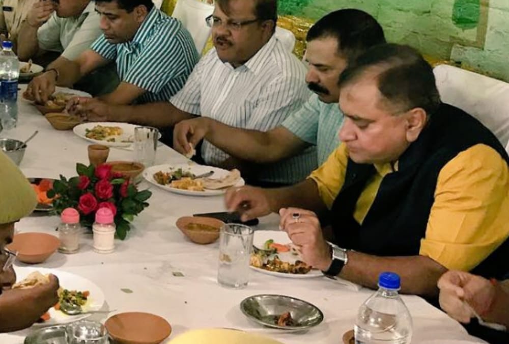 UP DGP meets people outside his residence in lucknow.