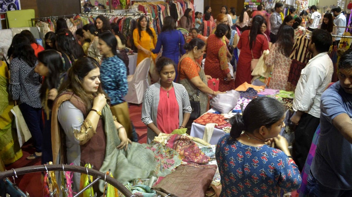 Varanasi ladies shopping in fair due to sawan