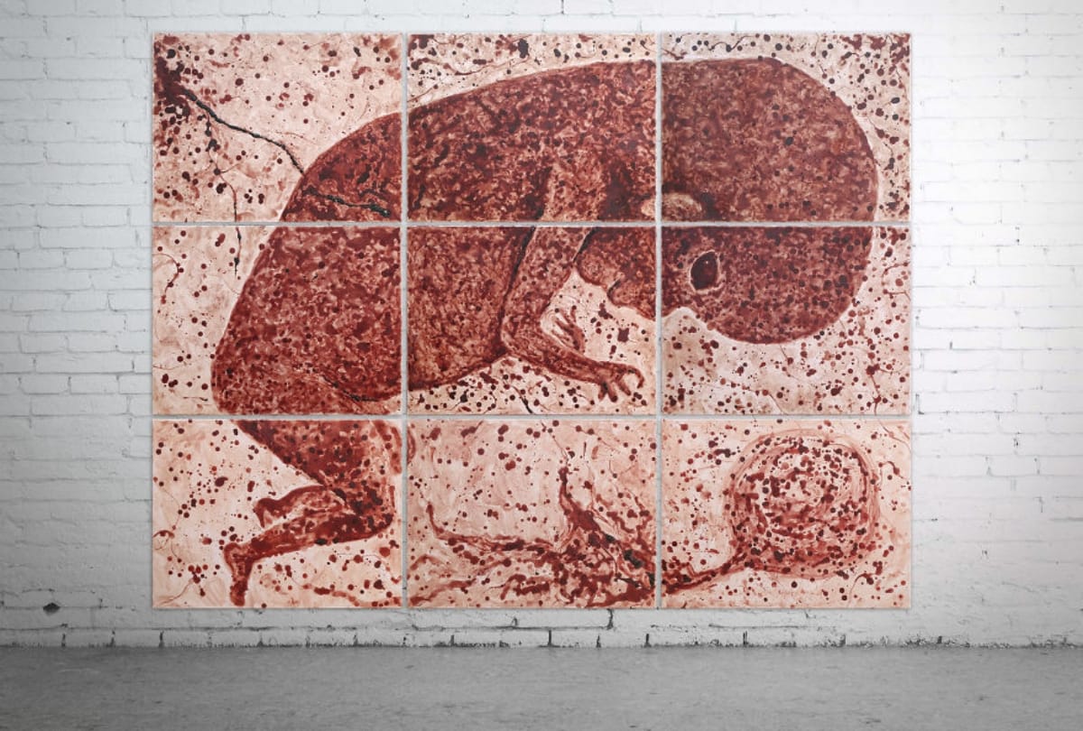 Women made a painting with the blood of her period