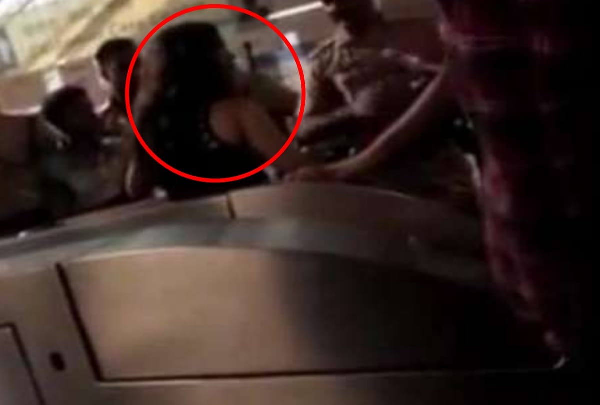 alcoholic girl shouting on metro station