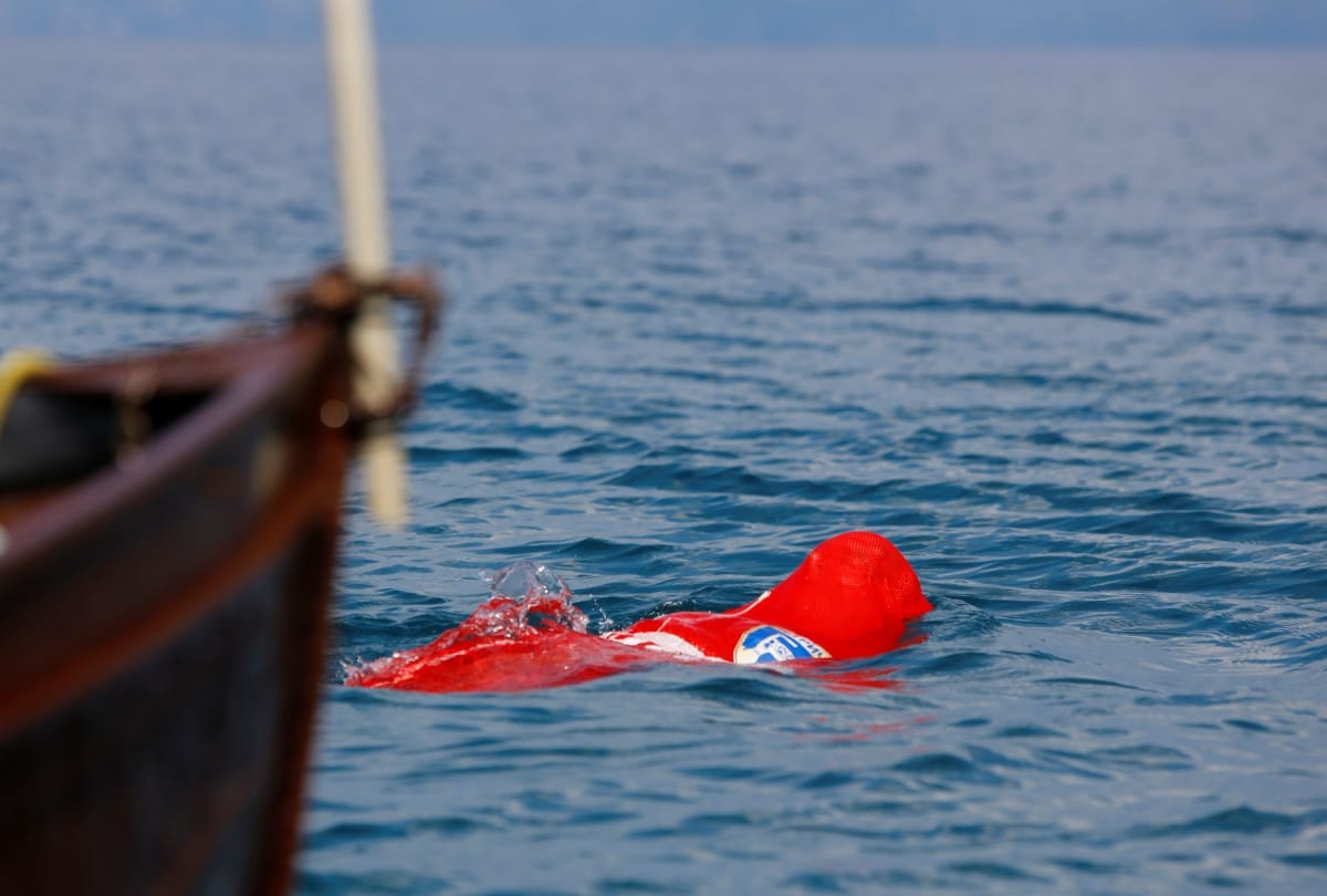 The sixty five year old man created world record for Swimming with tied hands and feet 