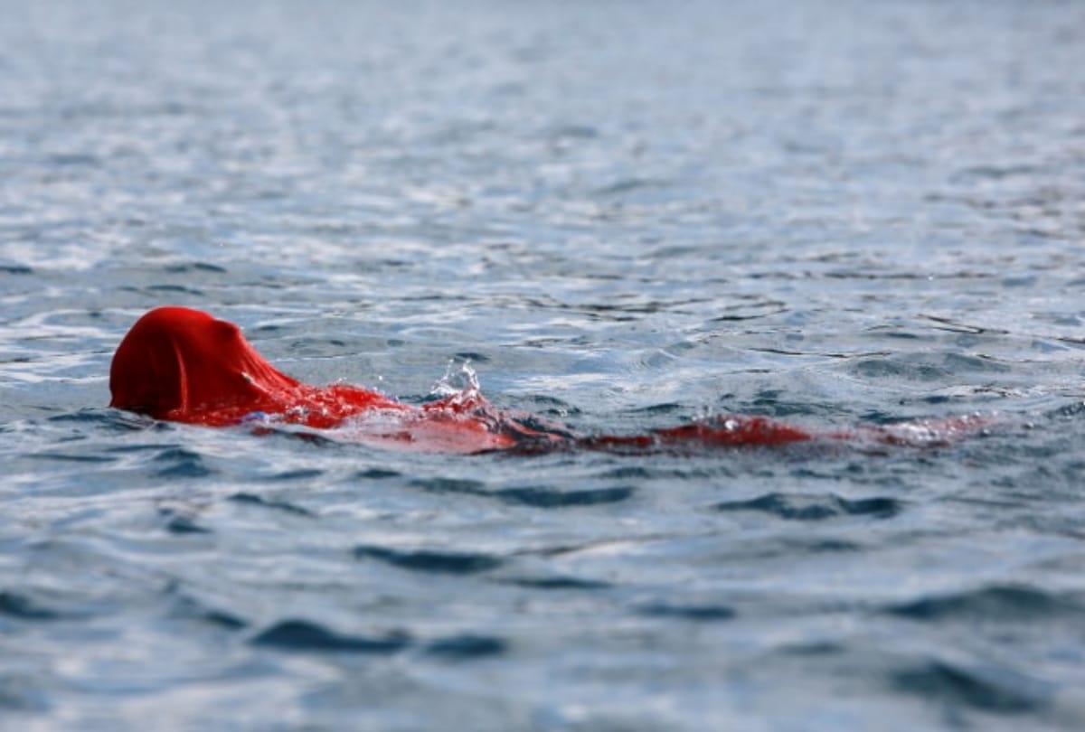 The sixty five year old man created world record for Swimming with tied hands and feet 