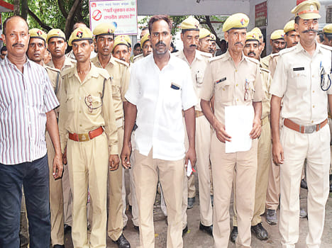 HomeGuard, supported by colleagues, performs at SP's office