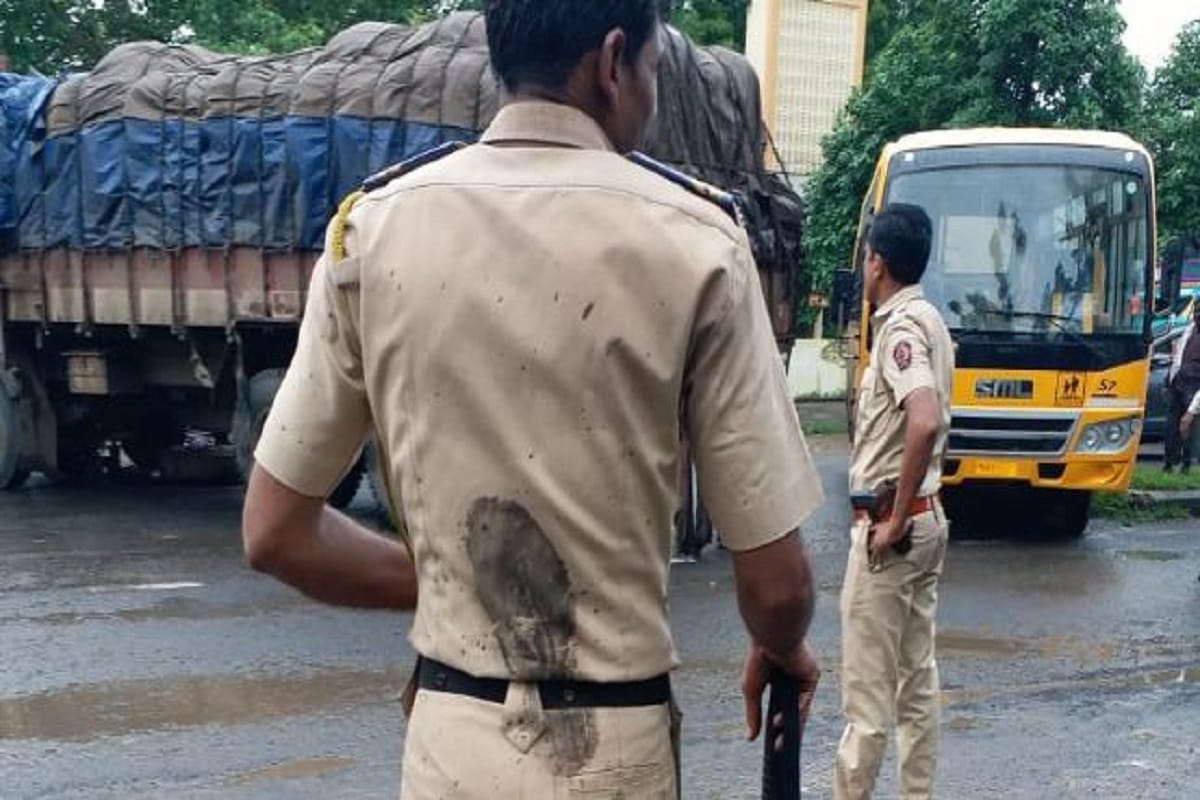 Maratha mob attack Maharashtra constable with a shoe says viral photograph