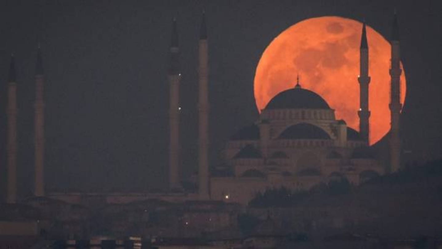 Watch longest lunar eclipse across the world through pictures