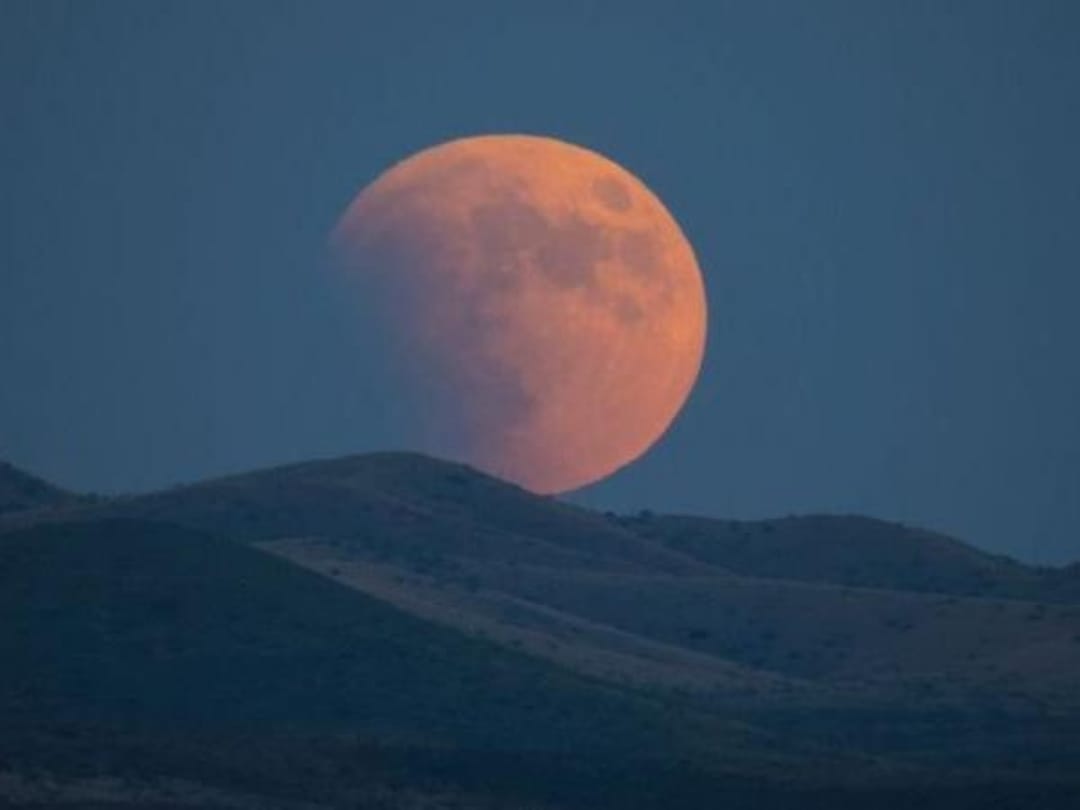 Watch longest lunar eclipse across the world through pictures