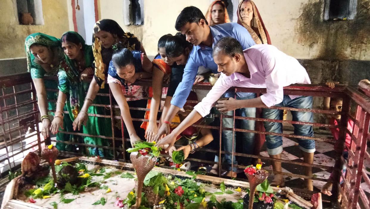 On the first day of the festival, devotees of Shiva temple