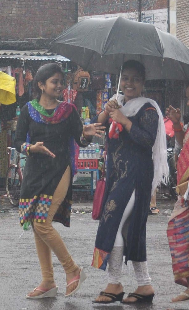 people smiled with rain 