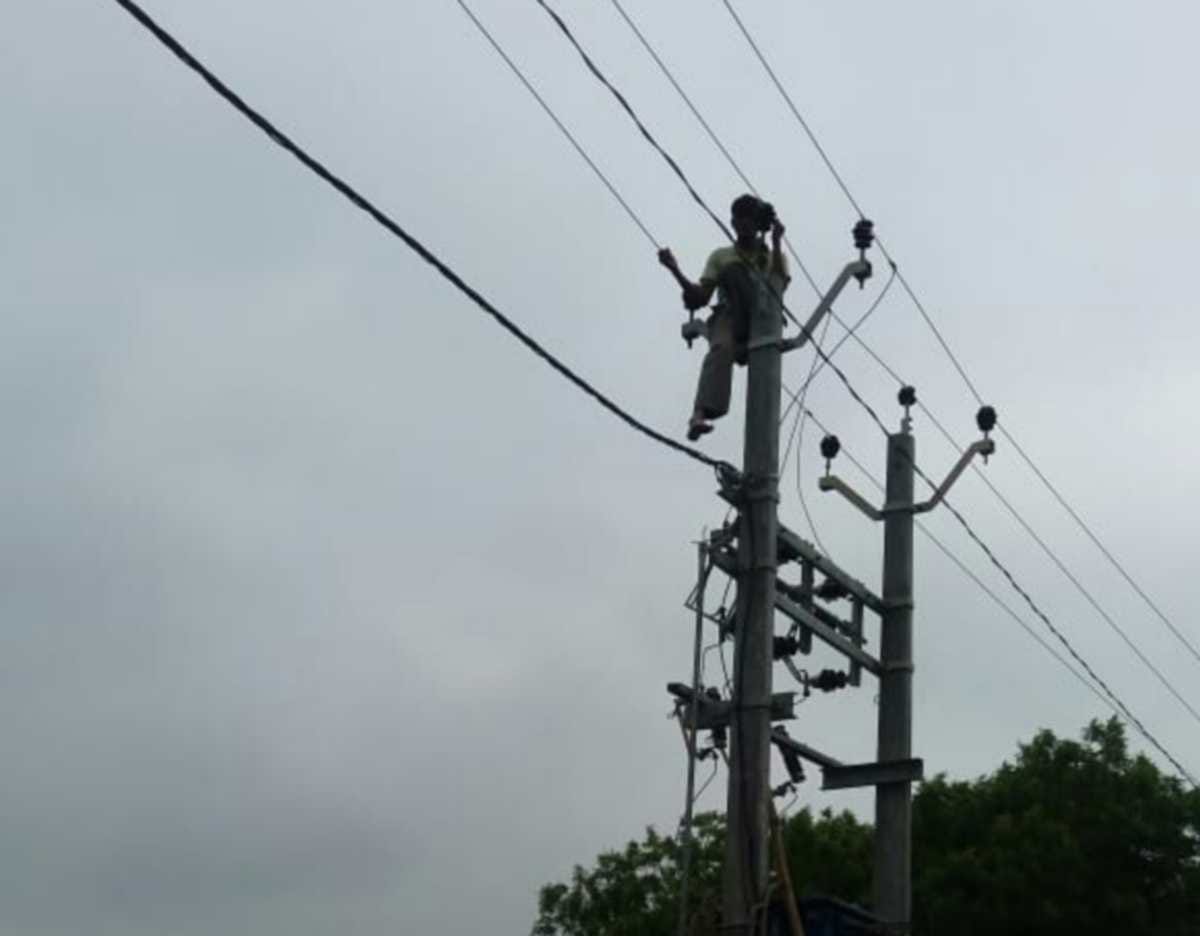 Azamgarh youth climbs on hightension line and playing games