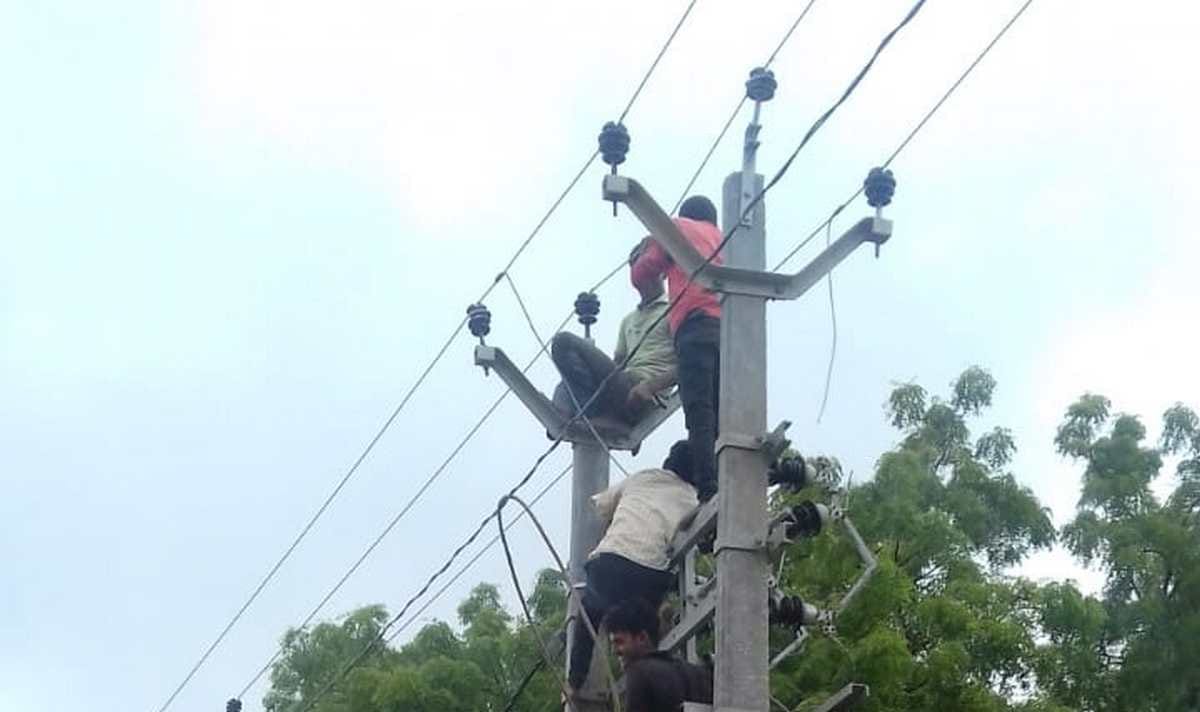 Azamgarh youth climbs on hightension line and playing games