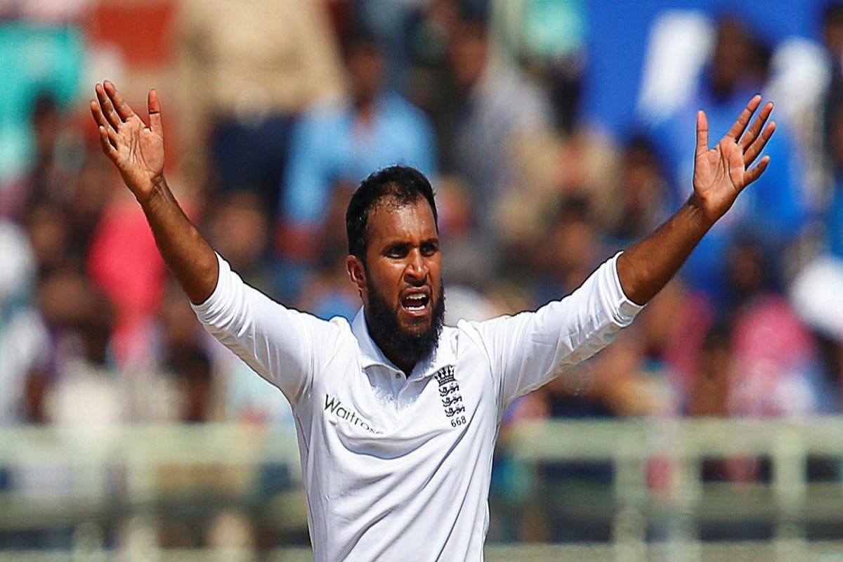 Moeen Ali and Adil Rashid runs away during England's victory champagne celebration