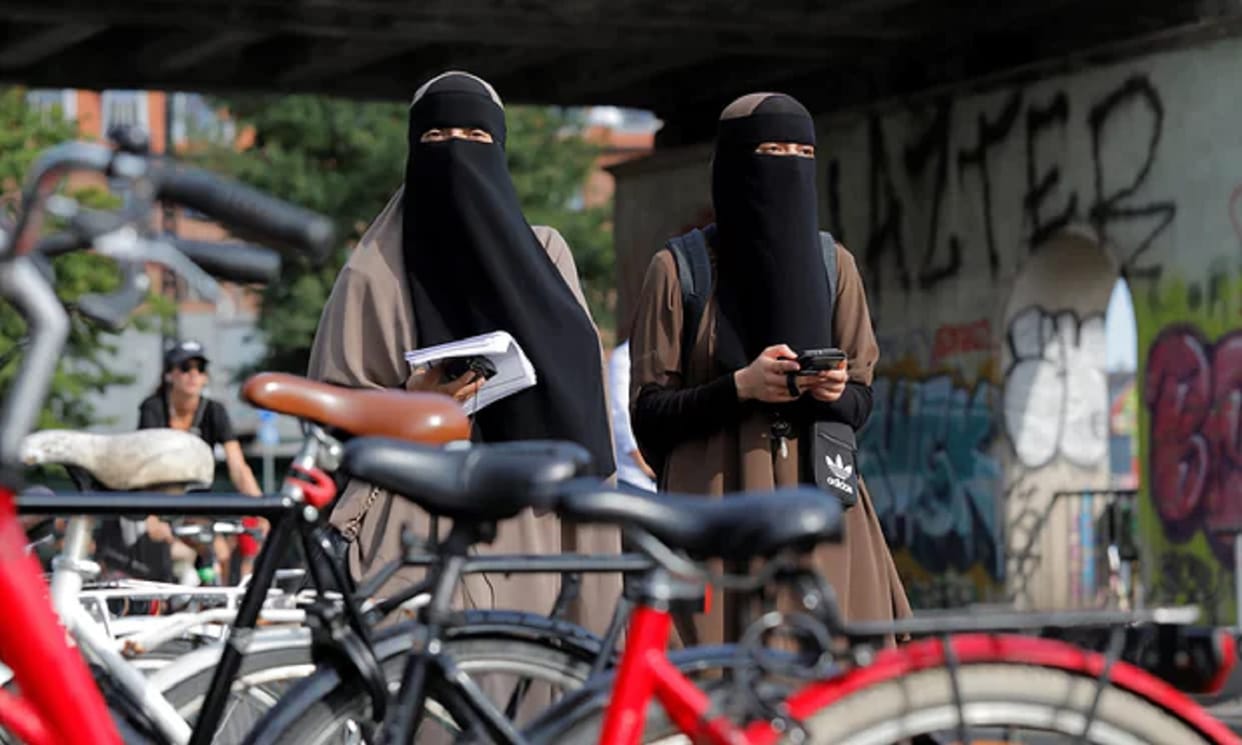 Taliban Islam Religious Police issue posters ordering women to cover up face with Burqa