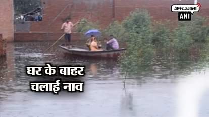 moradabad city colonies fillod by heavy rain water people using boat for traveling 
