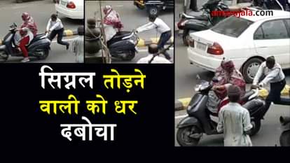traffic police catches a women who was breaking signal