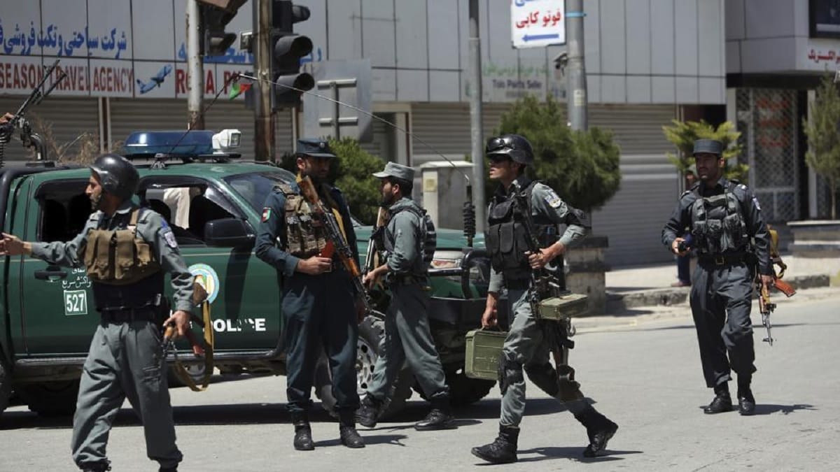 afghan officers says 20 killed in Taliban attack on police convoy