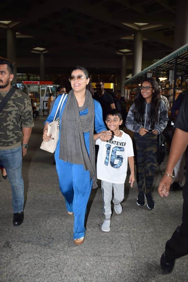 kajol and ajay devgn son yug at mumbai airport