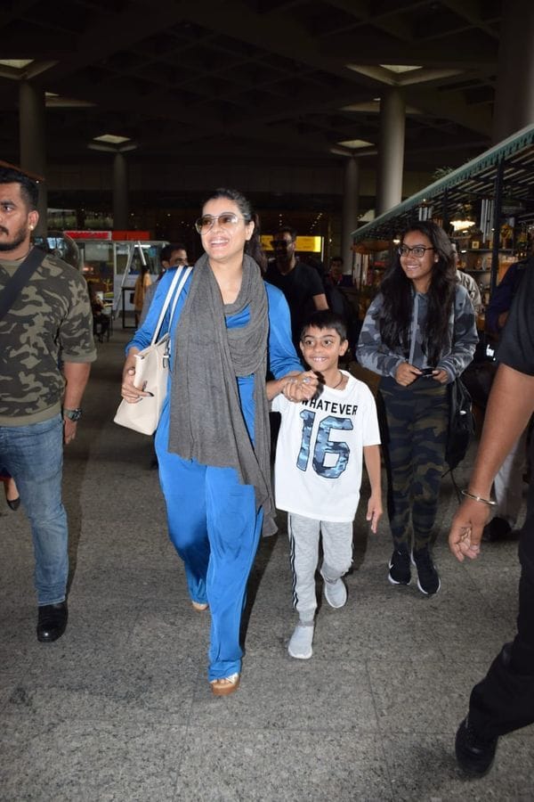 kajol and ajay devgn son yug at mumbai airport