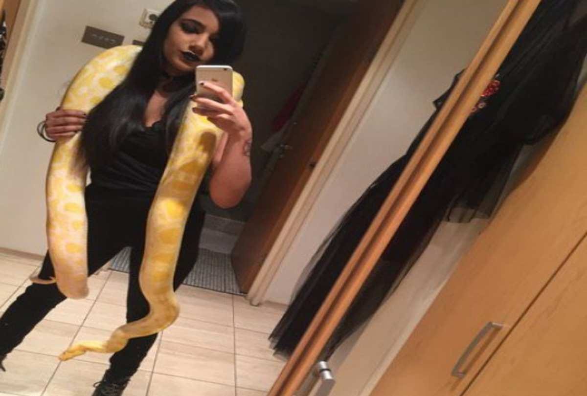 This Girl has attractive collection of snakes and python in London flat