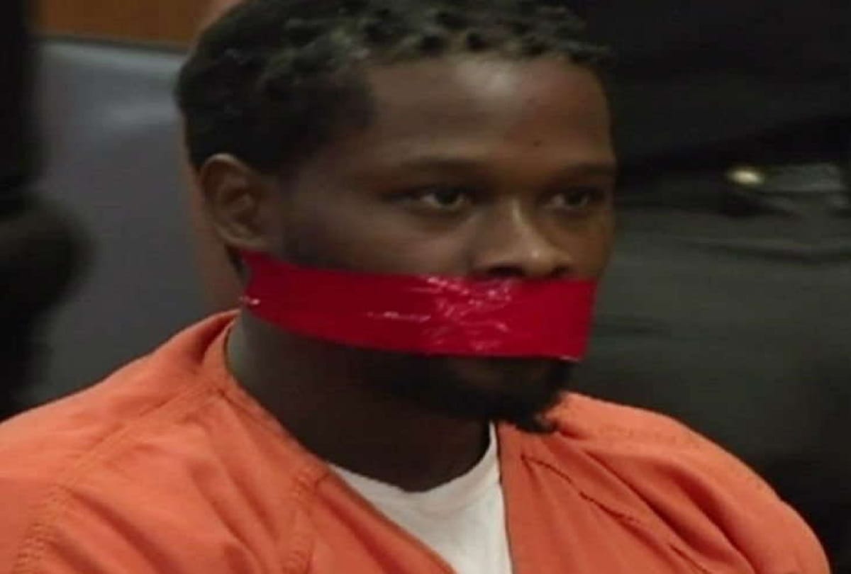 During the hearing, the judge ordered the tape on the accused mouth