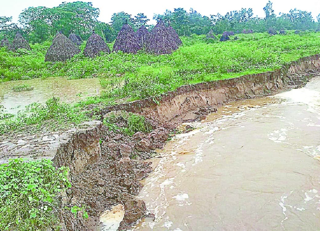 River embankment broken, danger of water entering village