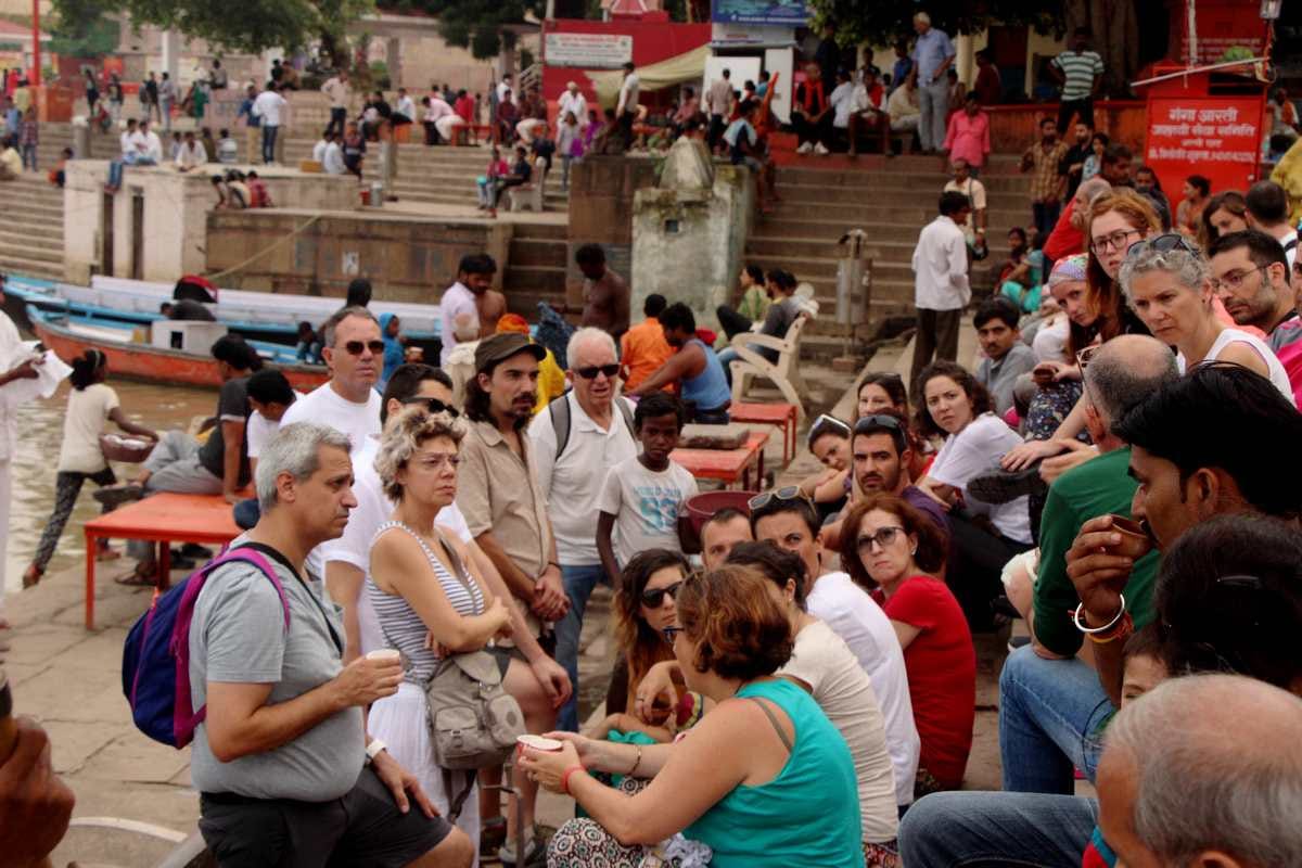 varanasi people enjoy on ganga ghat after clean weather