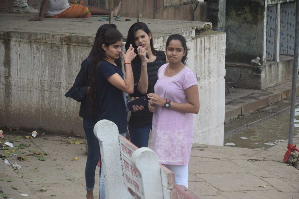 varanasi people enjoy on ganga ghat after clean weather