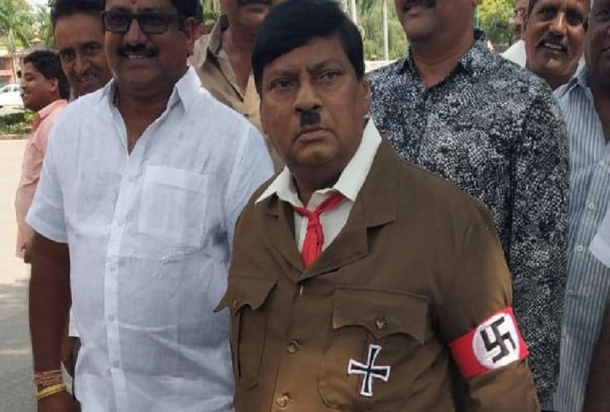 TDP mp Naramalli Sivaprasad dressed up as hitlor to protest against modi government