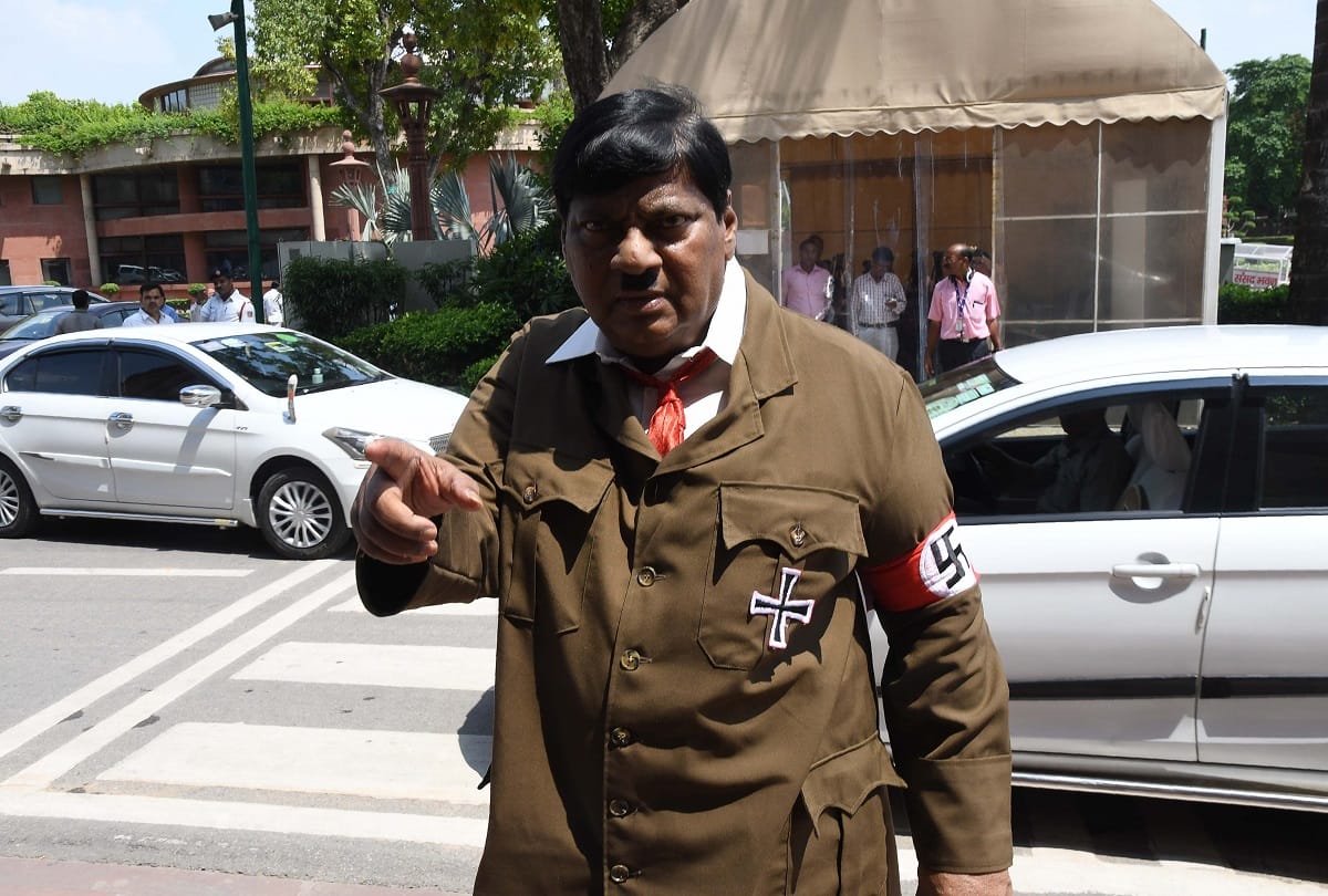TDP mp Naramalli Sivaprasad dressed up as hitlor to protest against modi government