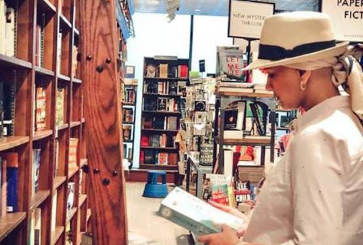 sonali bendre enjoying the day with reading book