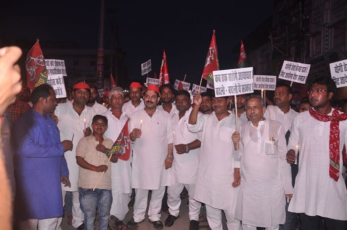 candle procession against deoria shelter home issue