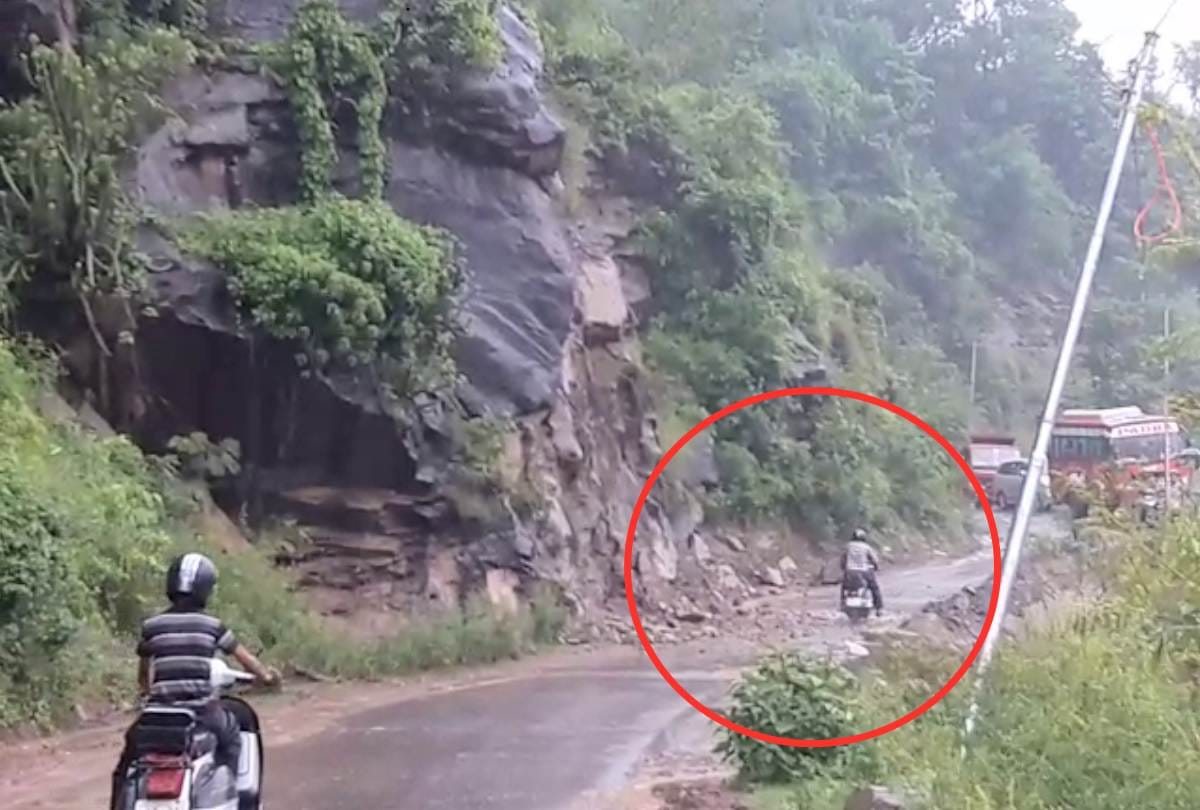 Bilaspur Himachal Pradesh Narrow escape for scooter rider in landslide