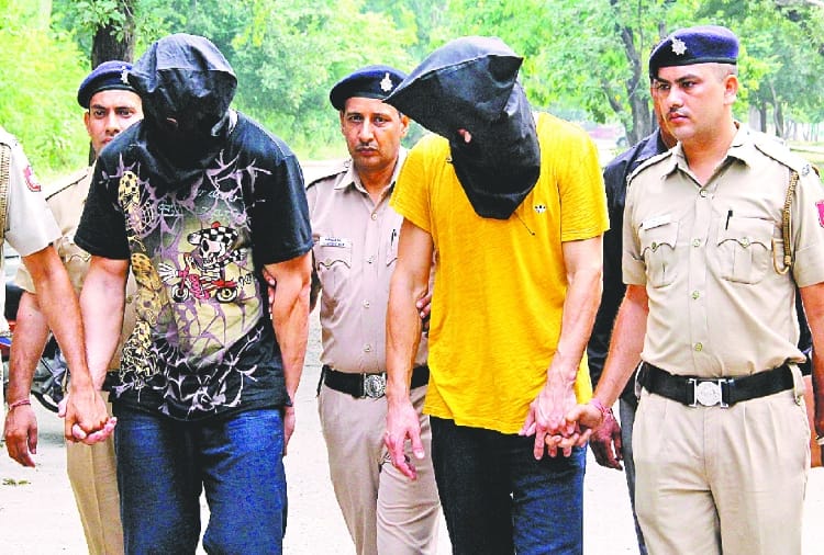 Two Romanian man arrested for installing Cloning device in ATM