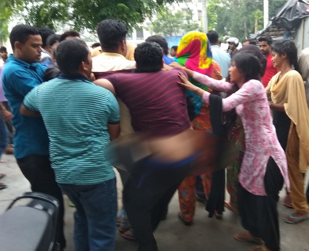 crowd beating doctor in death of mother and newborn baby