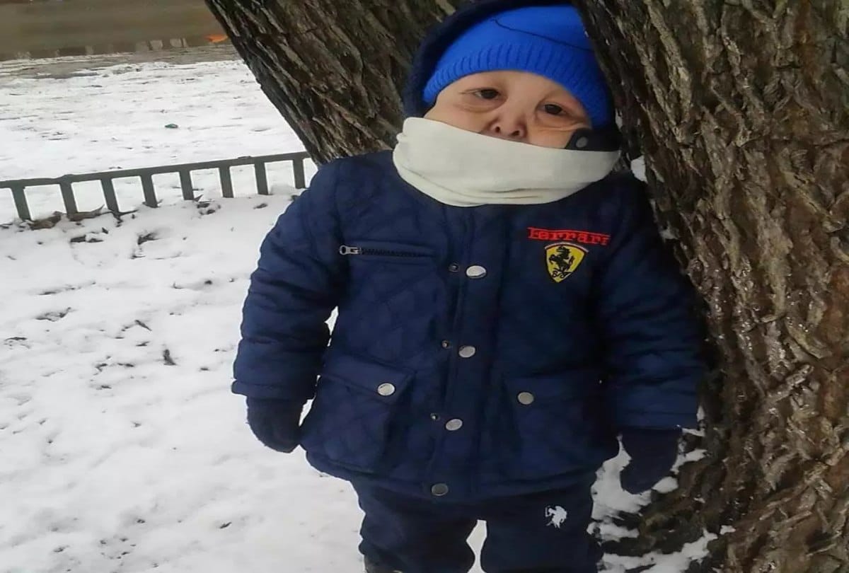 In the age of six only the boy looks like wrinkled pensioner