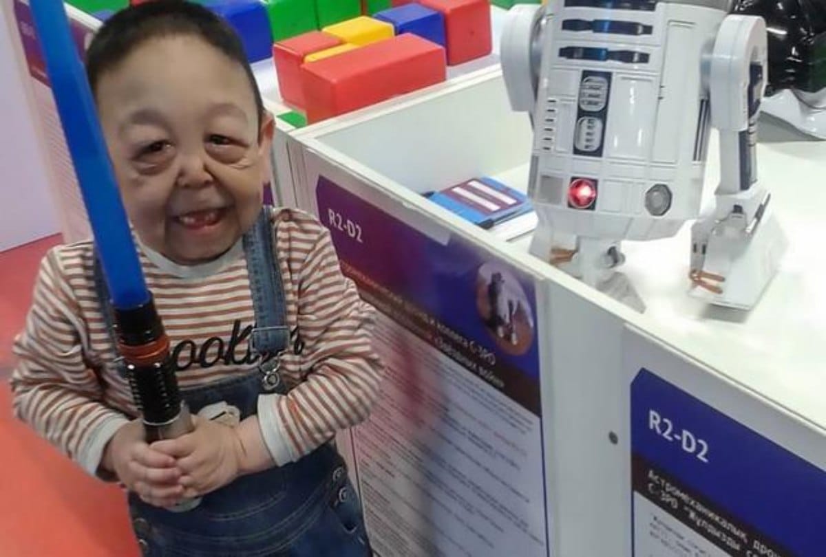 In the age of six only the boy looks like wrinkled pensioner