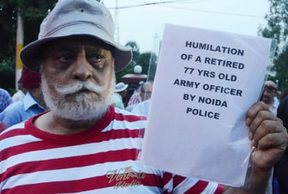 retired colonel assault case in police station, adm gunner and servant arrest and full update