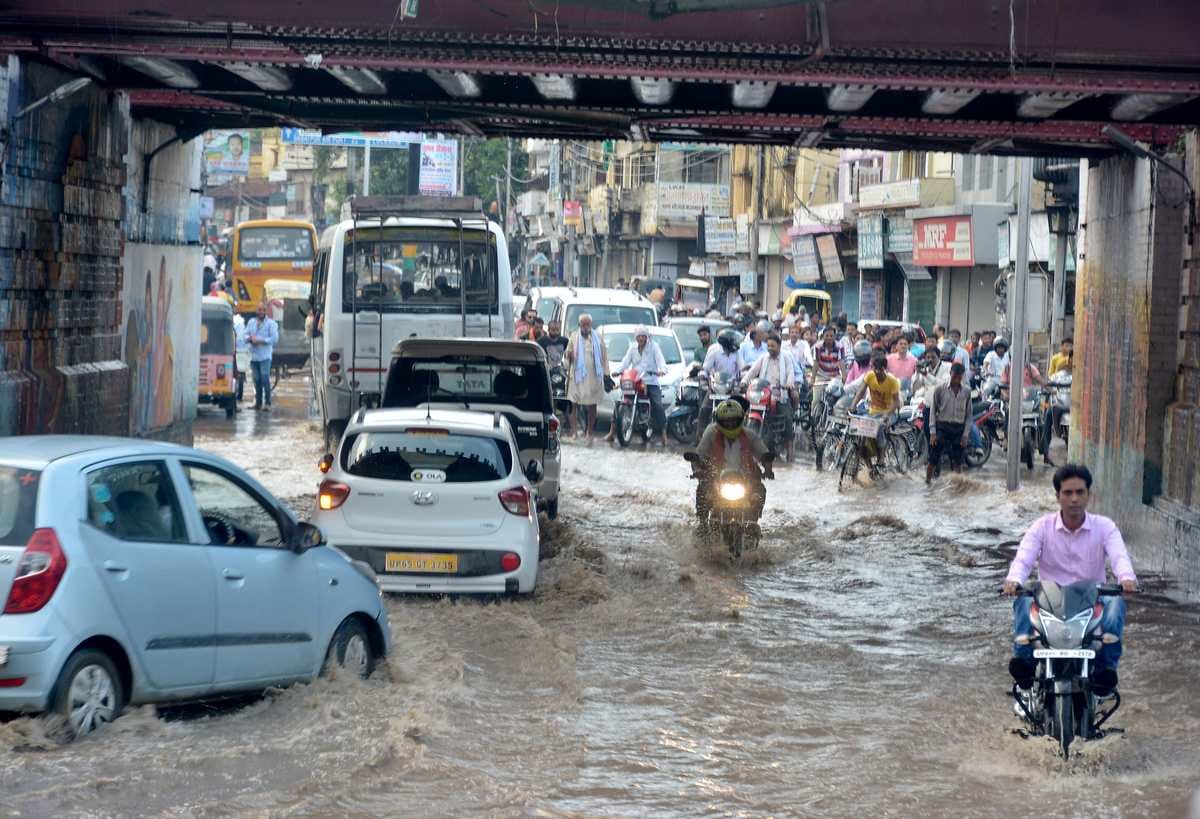 See the photos of rain in varanasi