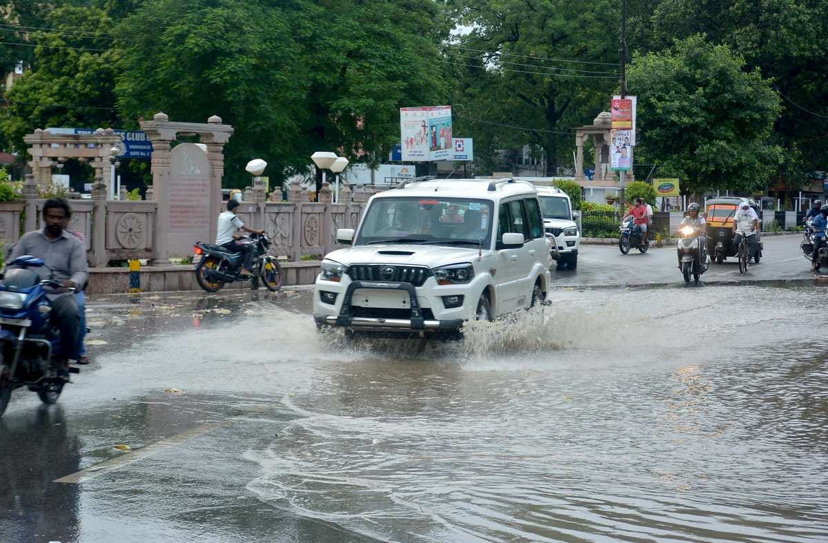 See the photos of rain in varanasi