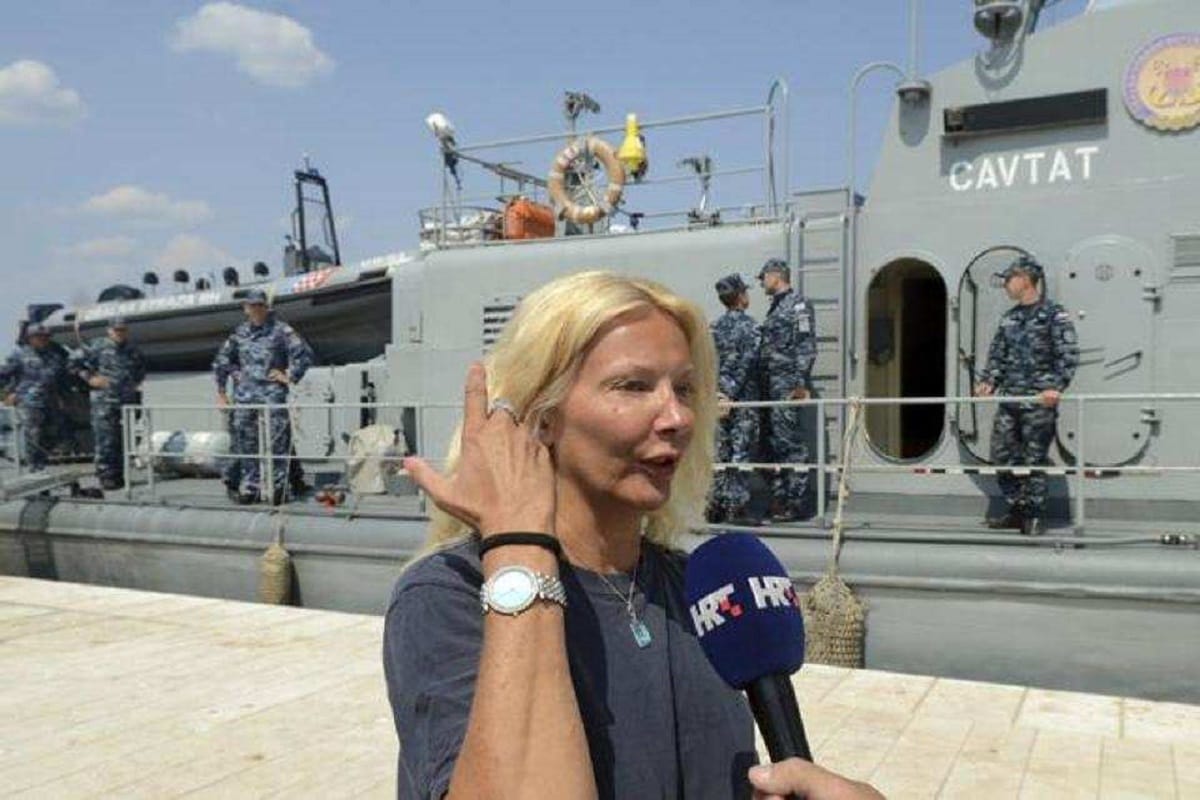 a britain Female tourist returning from the Adriatic Sea after stay full night 